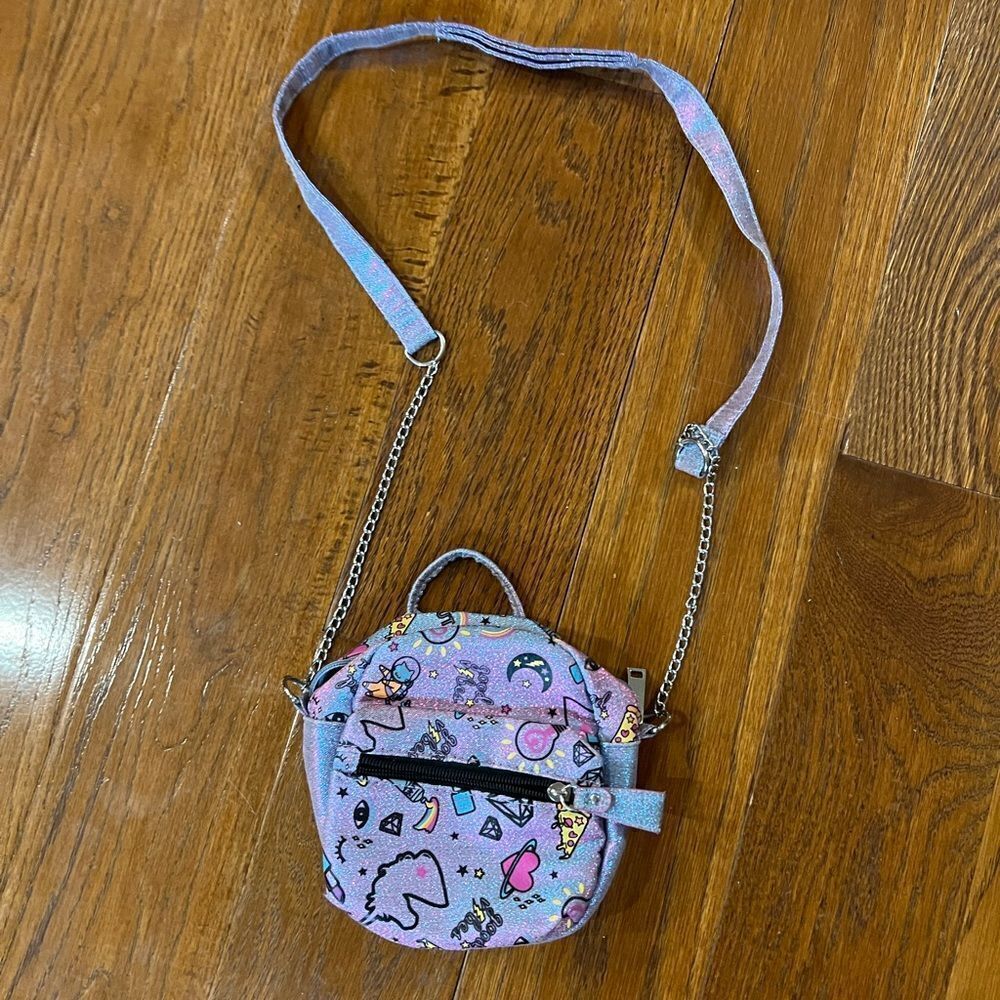 Gorgeous Glittery & metallic purple/blue w/graphics square Claire’s crossbody